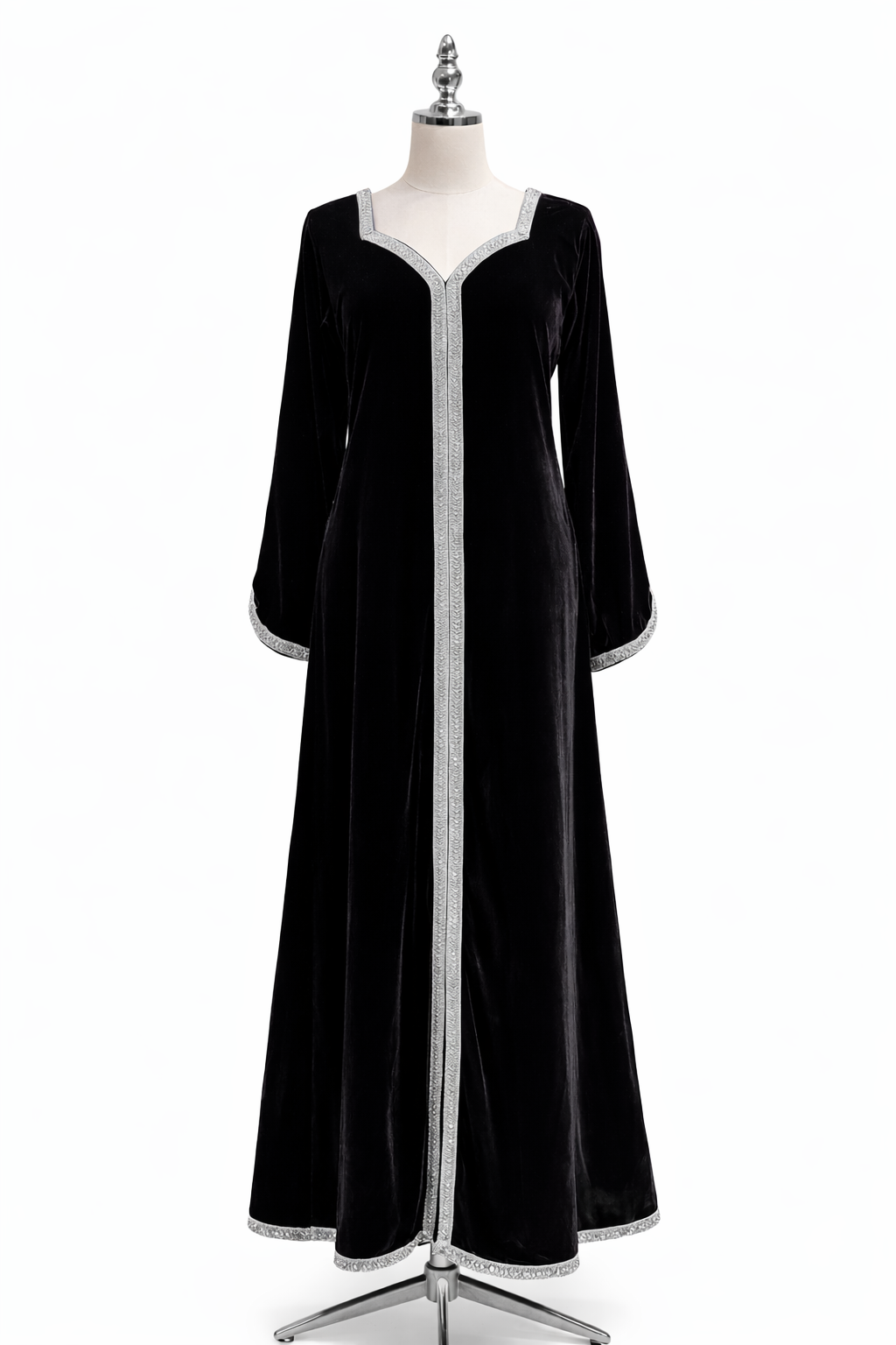 Black dress on a mannequin against a white background